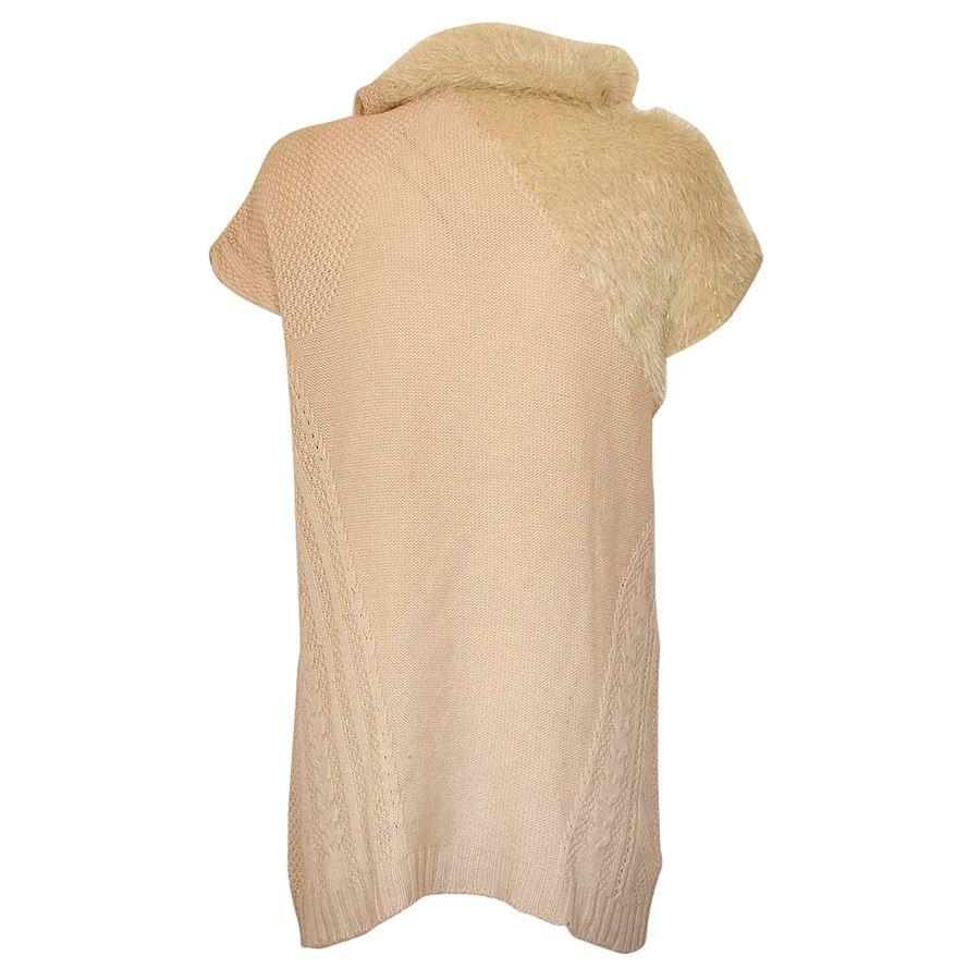 100% Virgin wool Ecru color Sleeveless Lateral fur High neck Total lenght cm 85 (335 inches)
