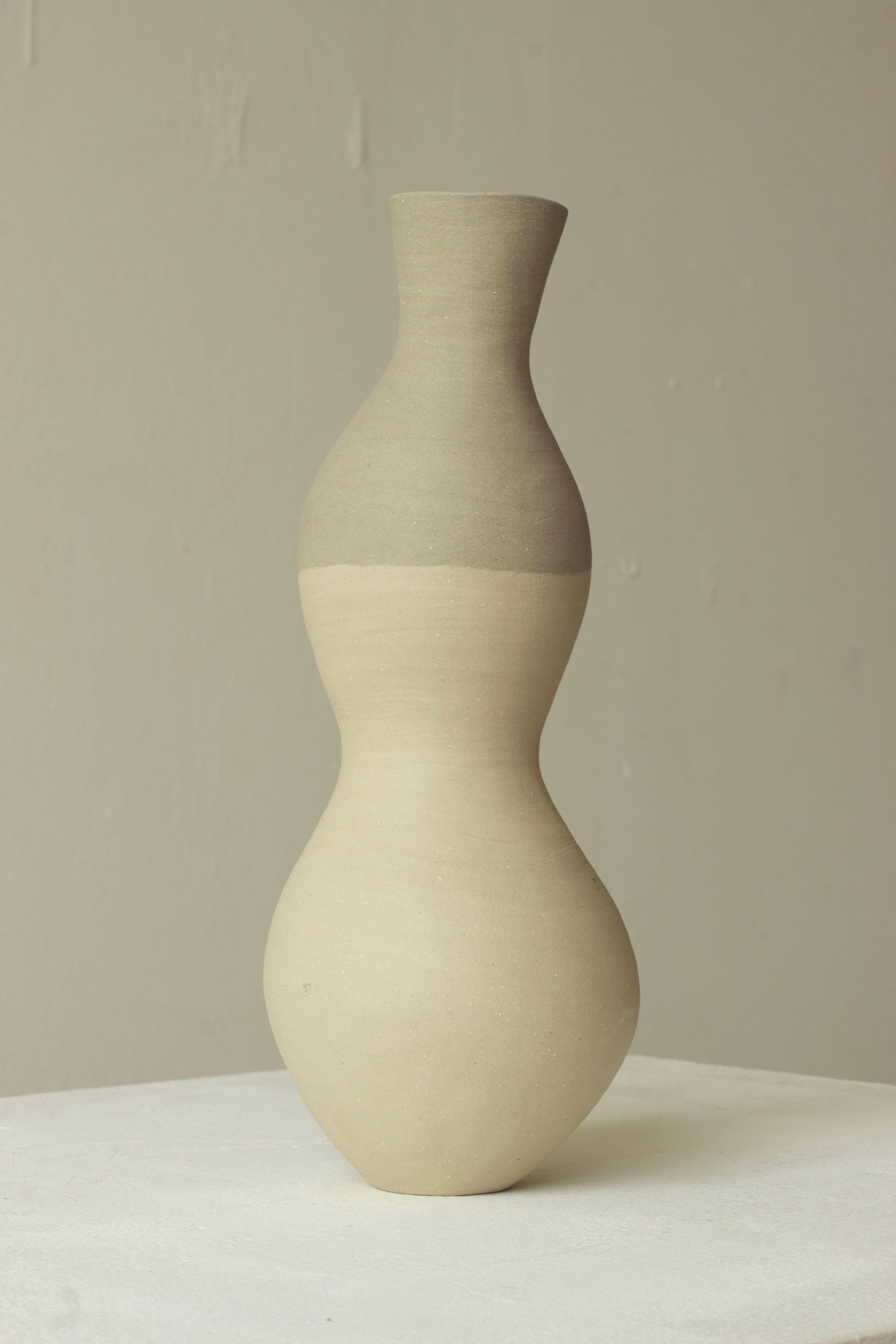 Woman 207 Vase by Karina Smagulova
One of a Kind.
Dimensions: Ø 10 x H 25 cm.
Materials: White and grey stoneware.
​
With an Armenian and Kazakhstan heritage, Karina Smagulova was born in Greece in 1995 and graduated with a diploma in Architecture