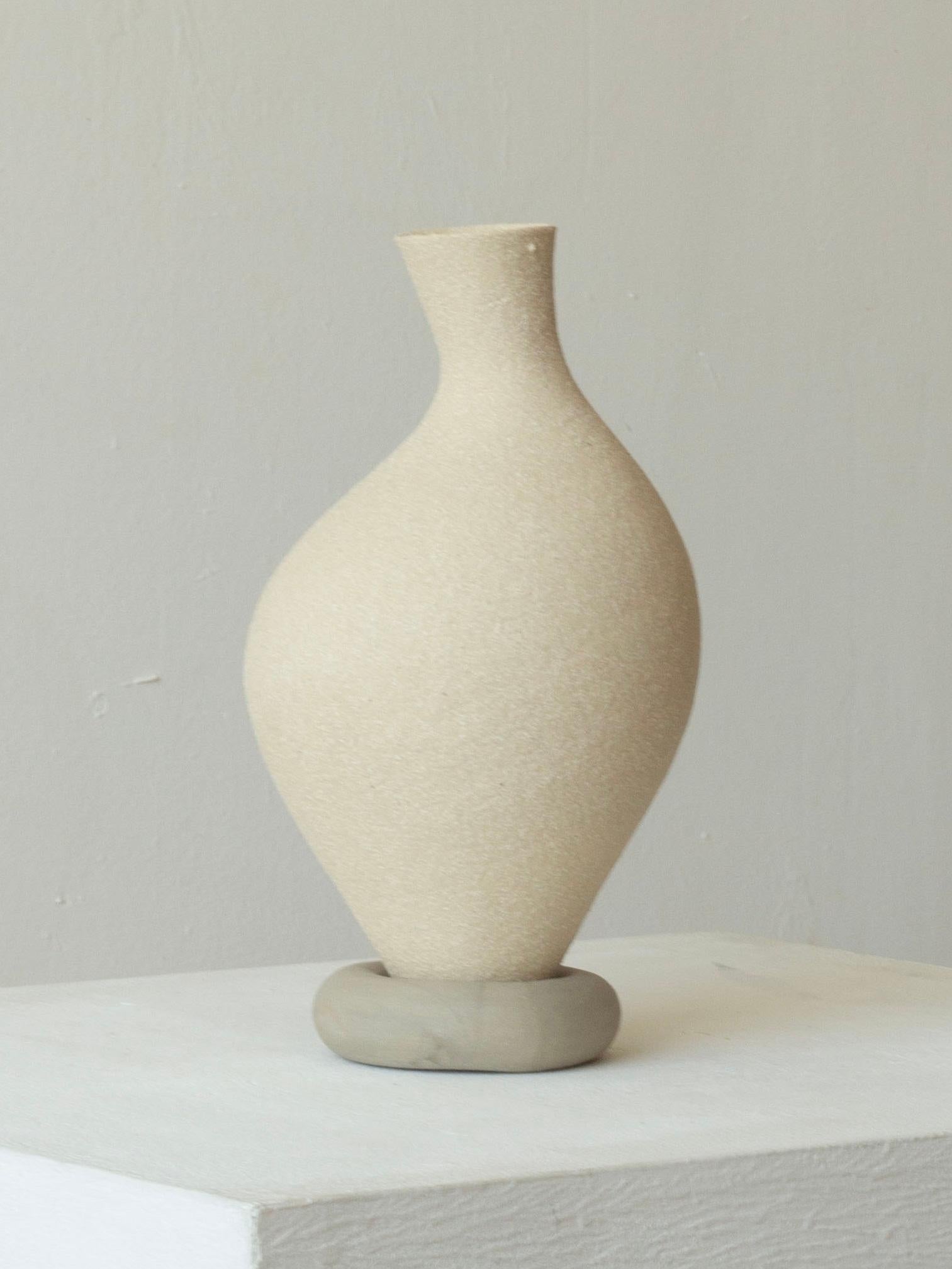 Woman 216 Vase by Karina Smagulova
One of a Kind.
Dimensions: Ø14 x H 24 cm.
Materials: White and grey stoneware.
​
With an Armenian and Kazakhstan heritage, Karina Smagulova was born in Greece in 1995 and graduated with a diploma in Architecture