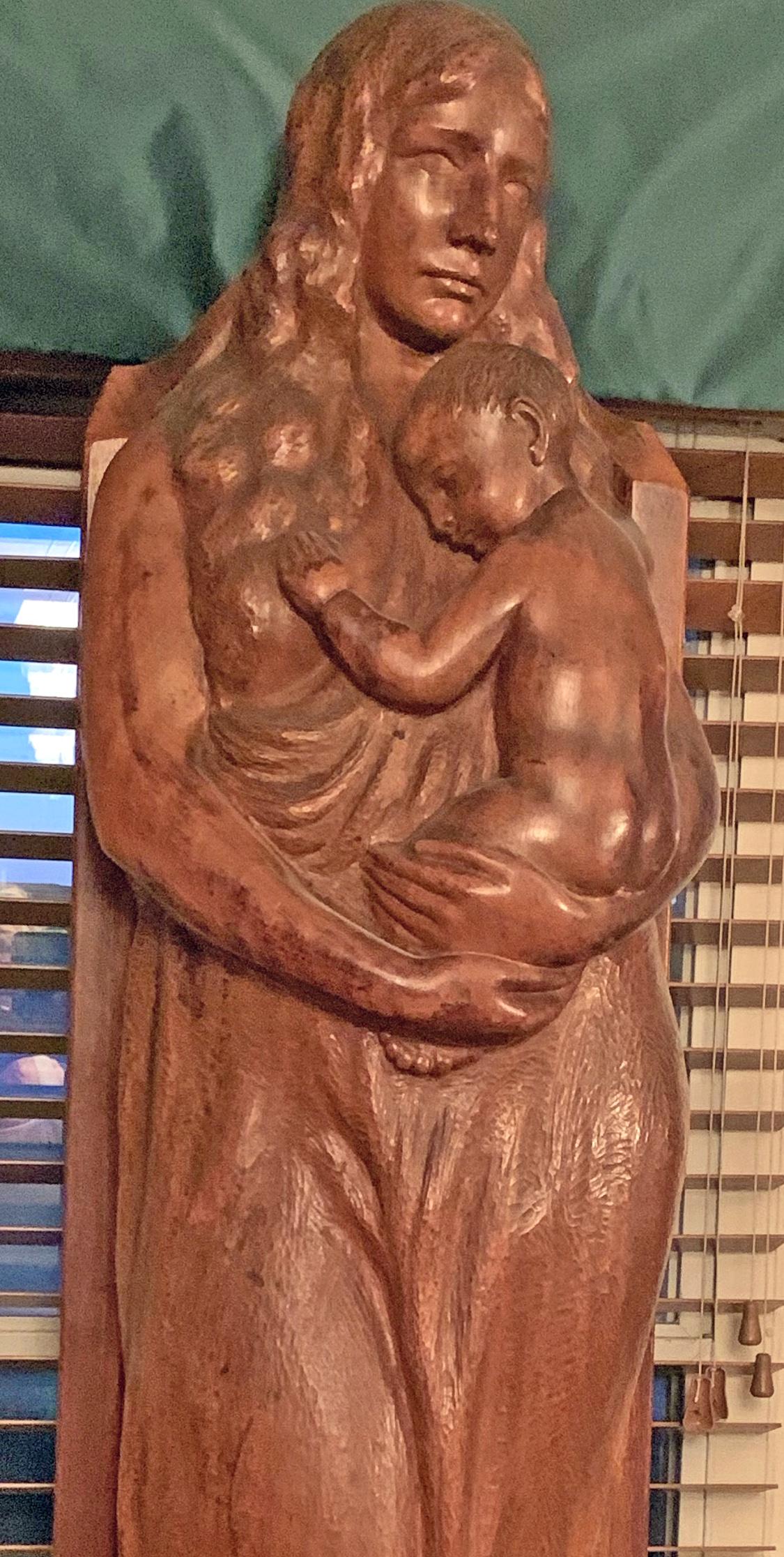 Large and highly affecting, this 52-inch high mahogany sculpture of a woman holding her child, looking out pensively into the world, won the Frank Logan Medal of the Arts at the 22nd Chicago Artist Exhibition in 1918. It is the greatest masterpiece