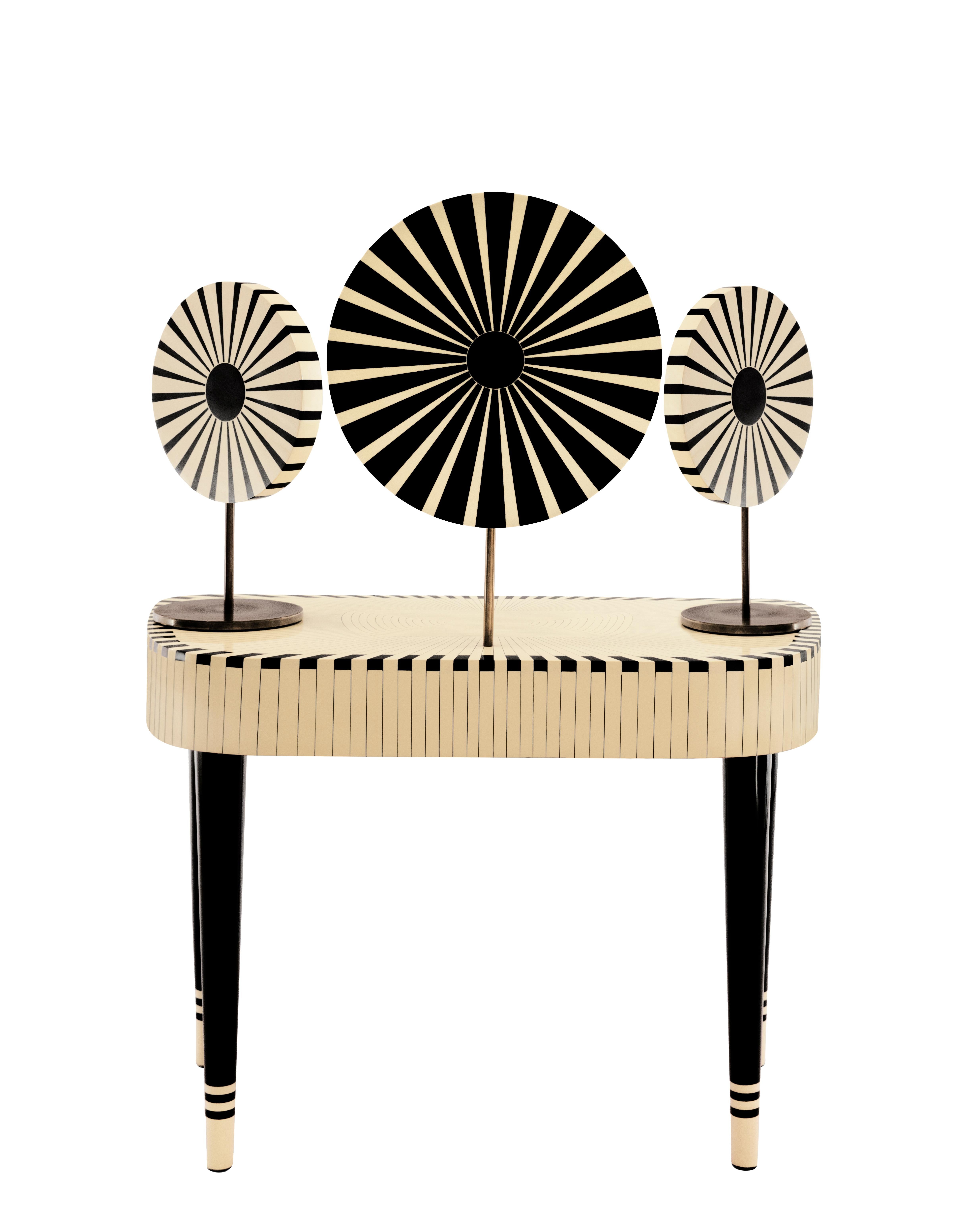 Woman in Paris Vanity Table by Matteo Cibic is a stunning dressing table with two drawers and three mirrors, two of which can be moved to desired angles. It is available in a range of colors, which can be customized according to the space.

India's