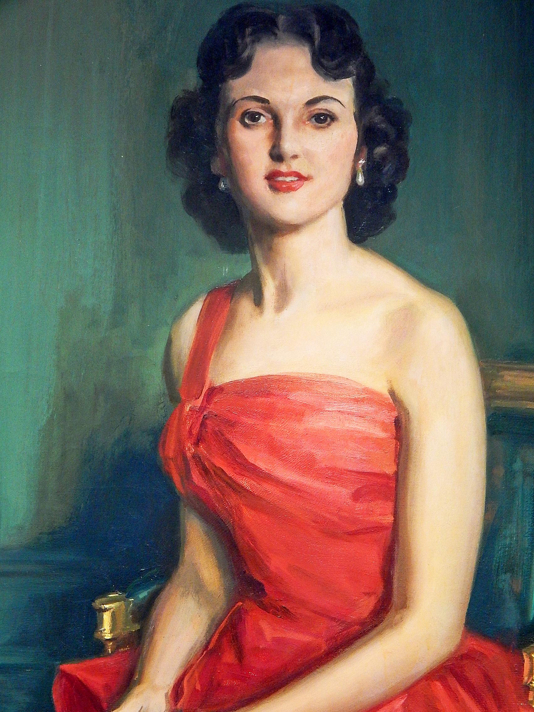 One of the most vivacious and brilliantly-painted portraits we have ever offered, this depiction of a stylish and confident young woman in a dress in candy apple red taffeta was painted by Waldo Murray, an artist who worked in both Great Britain and