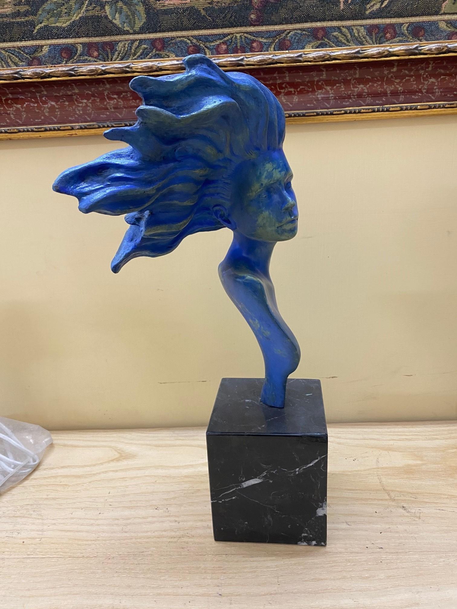 Classic inspiration and modern flair merge in this exquisite piece that will add a timeless accent to any decor. Superbly crafted of bronze forged using the lost-wax casting technique, this bust depicts the elegant figure of a feminine entity with