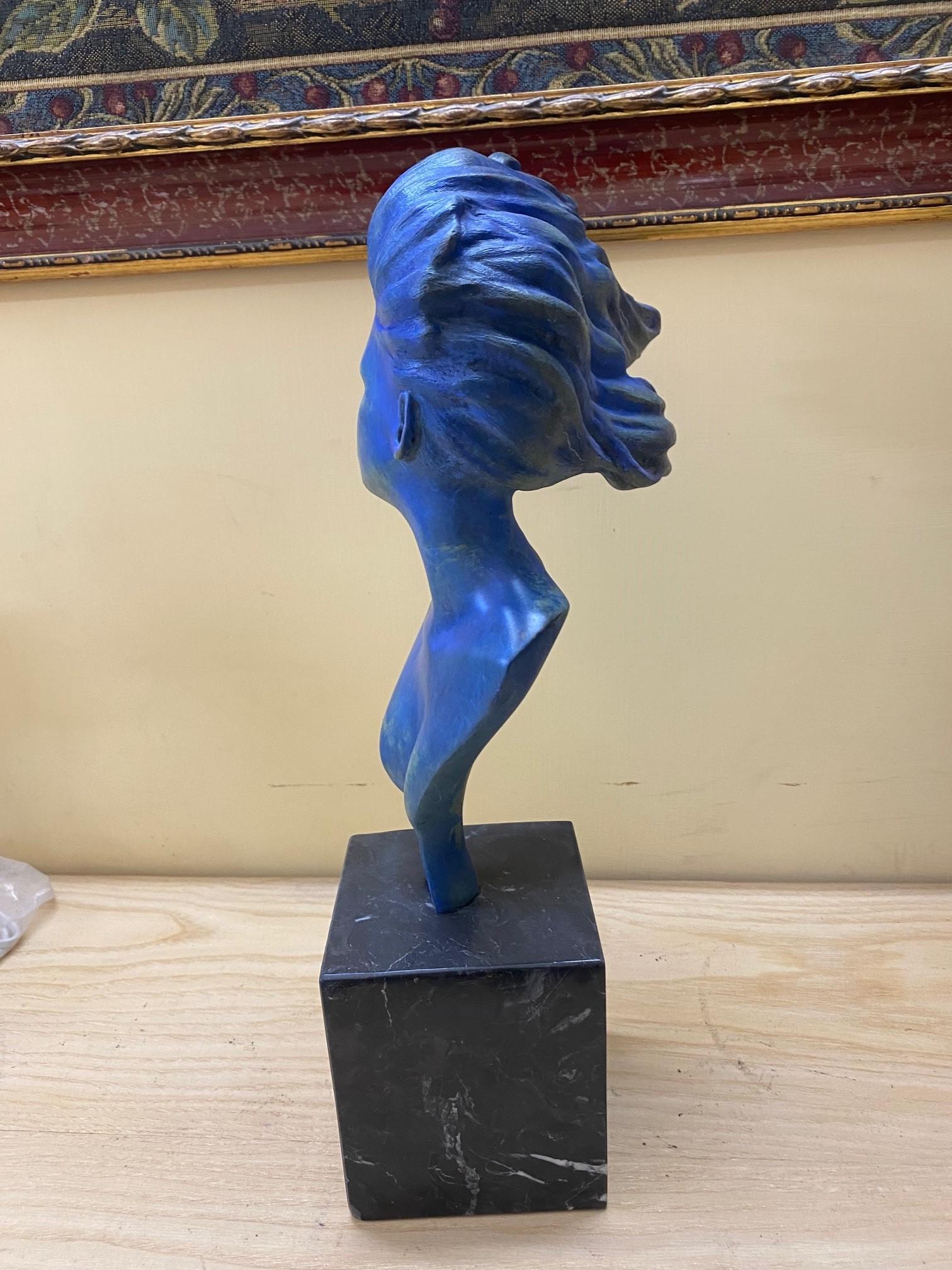 woman in the wind statue