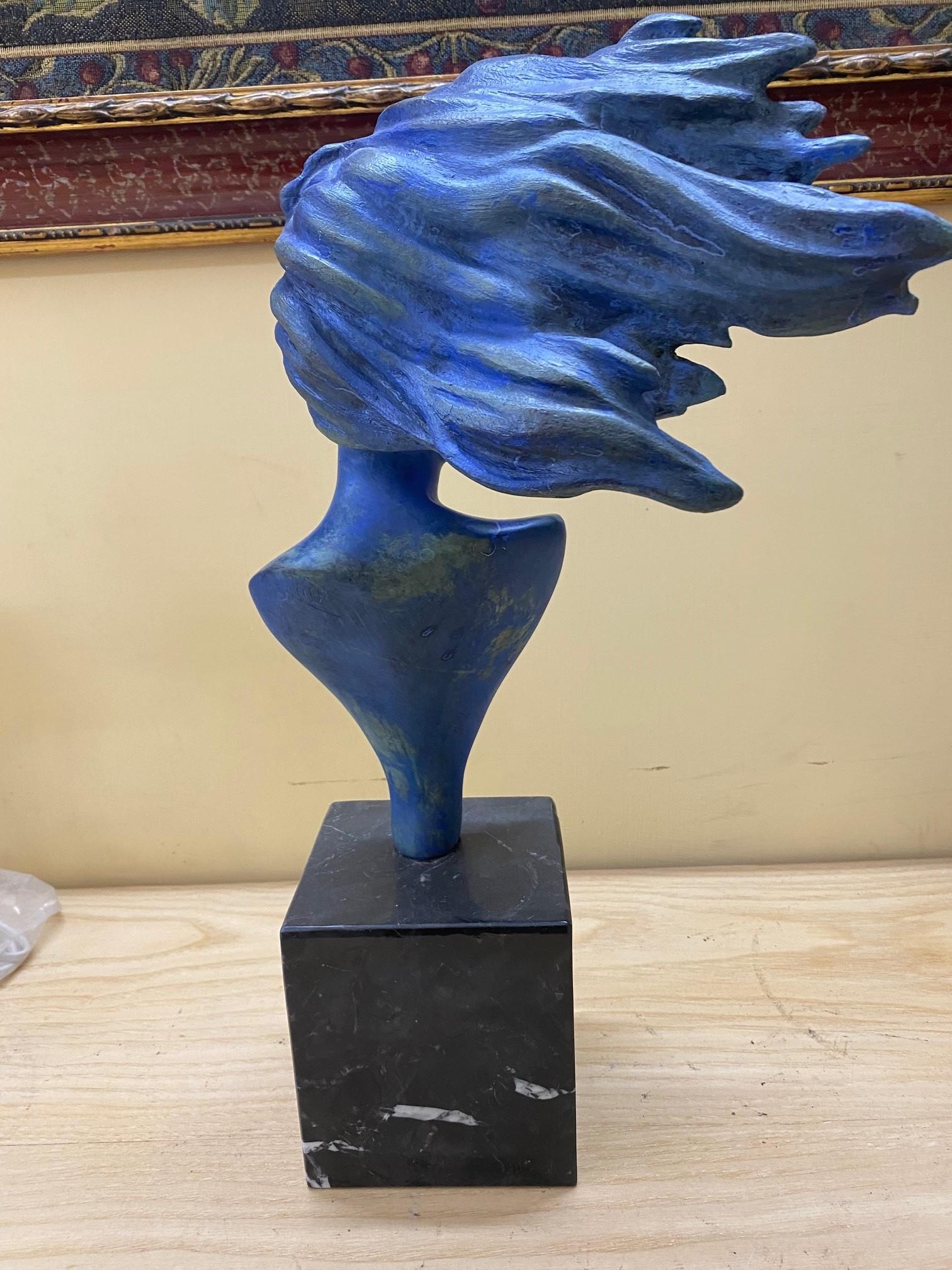 wind woman sculpture