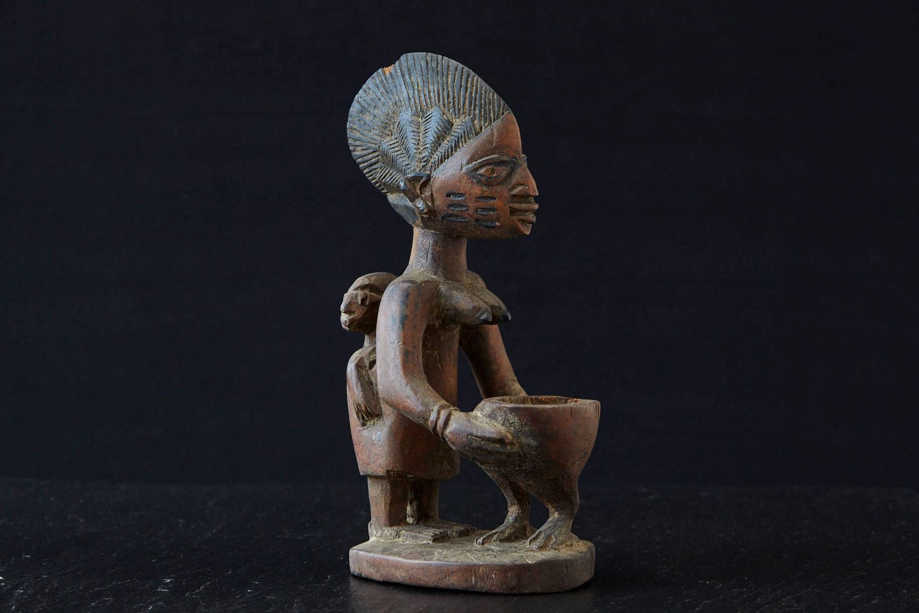Hand-Carved Woman Sacrificing Holding Offering Bowl, Yoruba People, Nigeria, 1940s For Sale