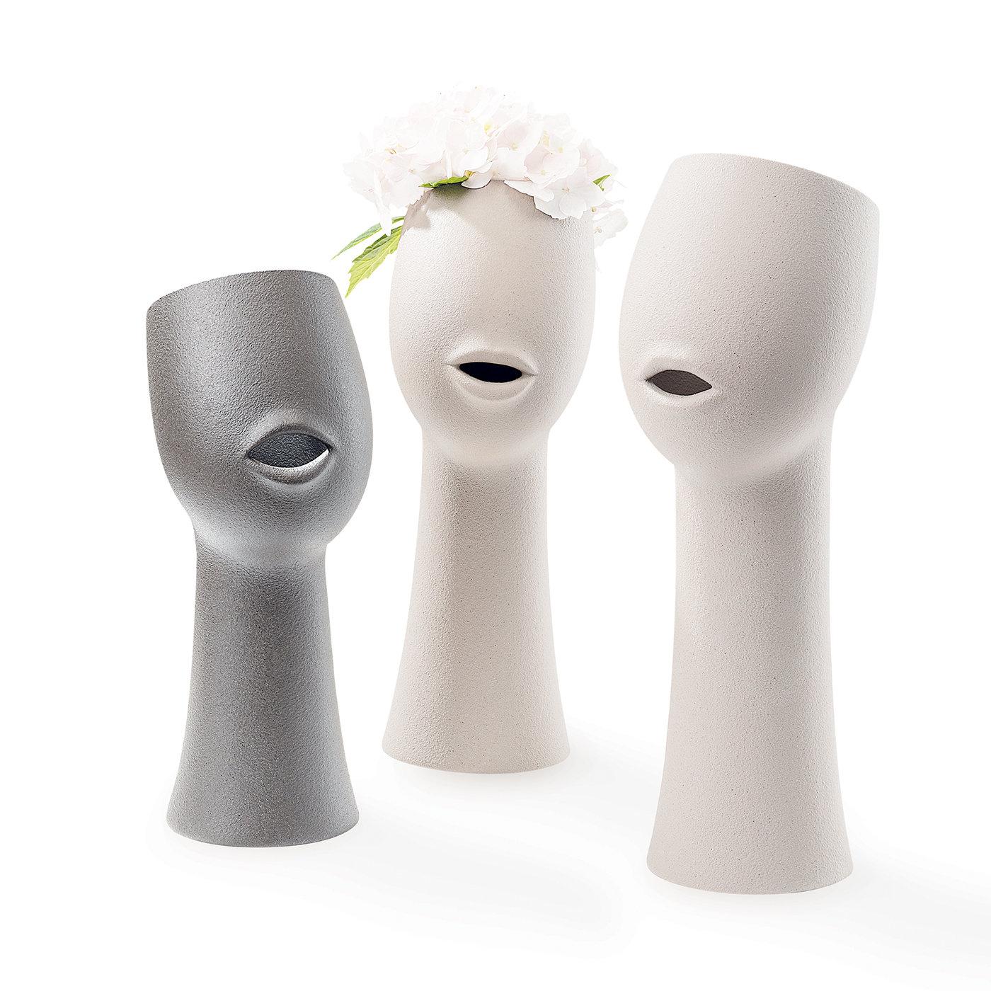 Delightfully unique, the Woman Vase by Giuseppe Bucco will compliment any contemporary setting. Characterized by the form of a neck and face and featuring a small opening in the shape of a mouth, this fascinating Woman Vase is 43 cm tall and crafted