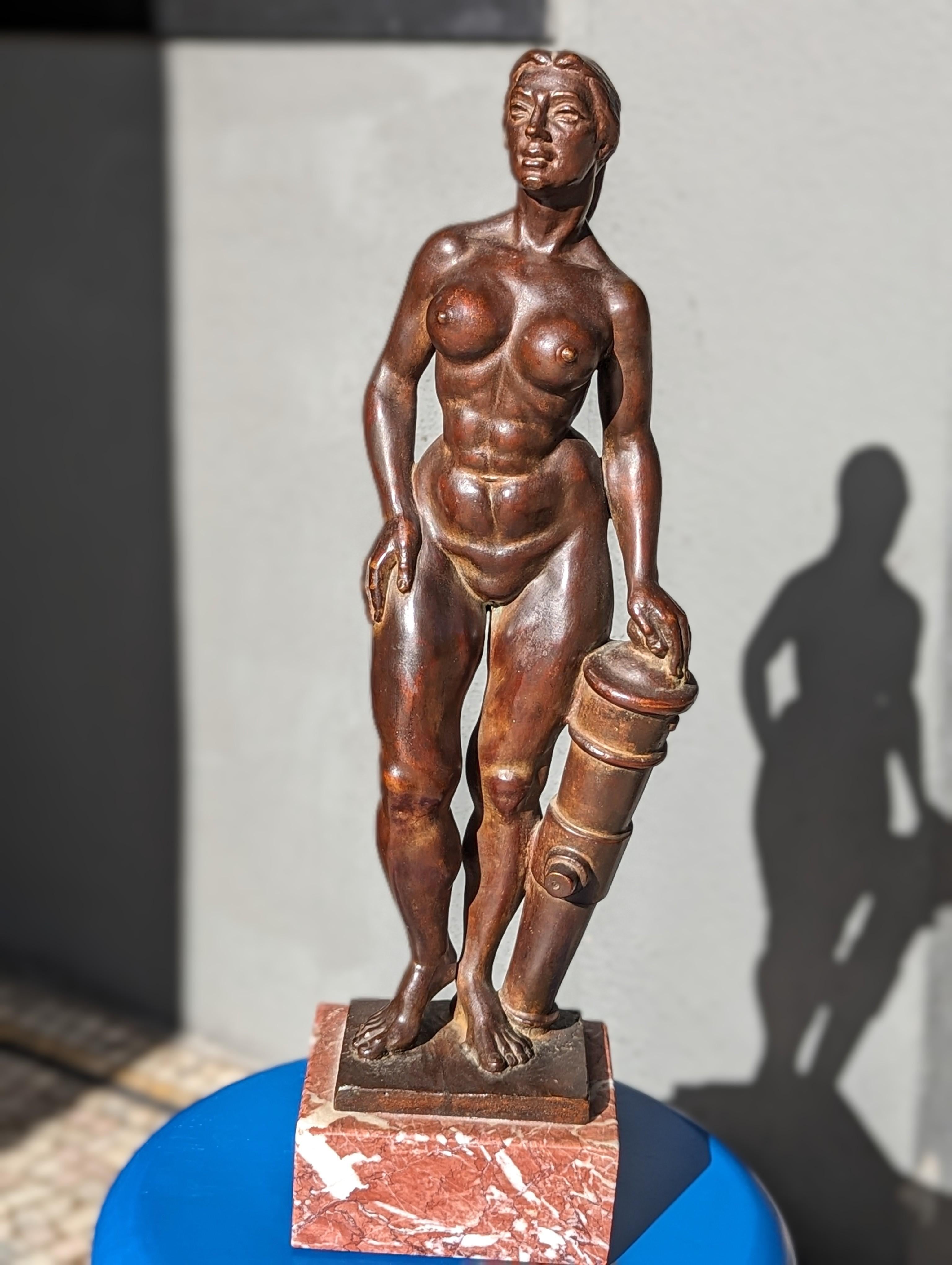 Classic female form beautifully rendered in Bronze atop a marble base signed and dated 1970 
What's a fearless muse without a trusty cannon? This one gleams like old gold as it rests by her side, a silent promise of fierce creativity and unstoppable