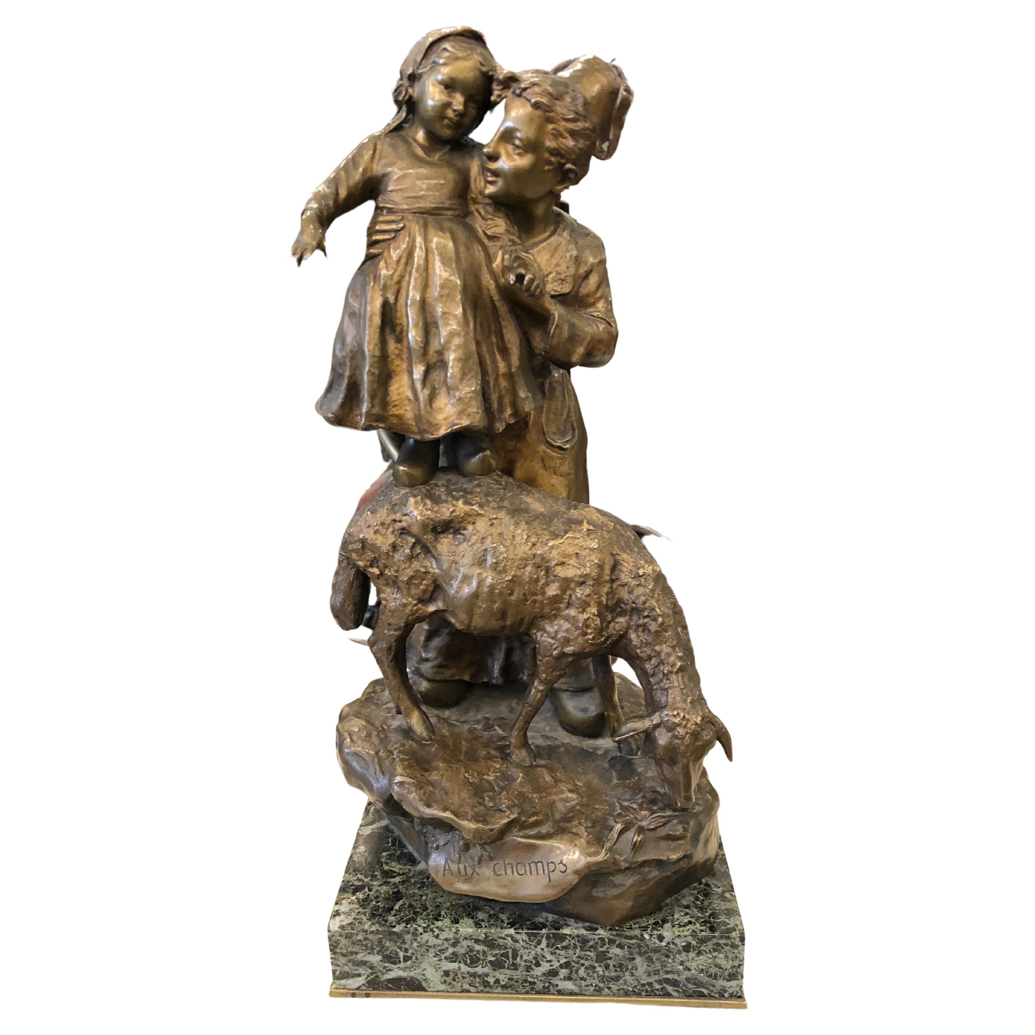 Femme avec enfant en bronze et marbre. Signe : J.D. Aste , Art nouveau en vente
