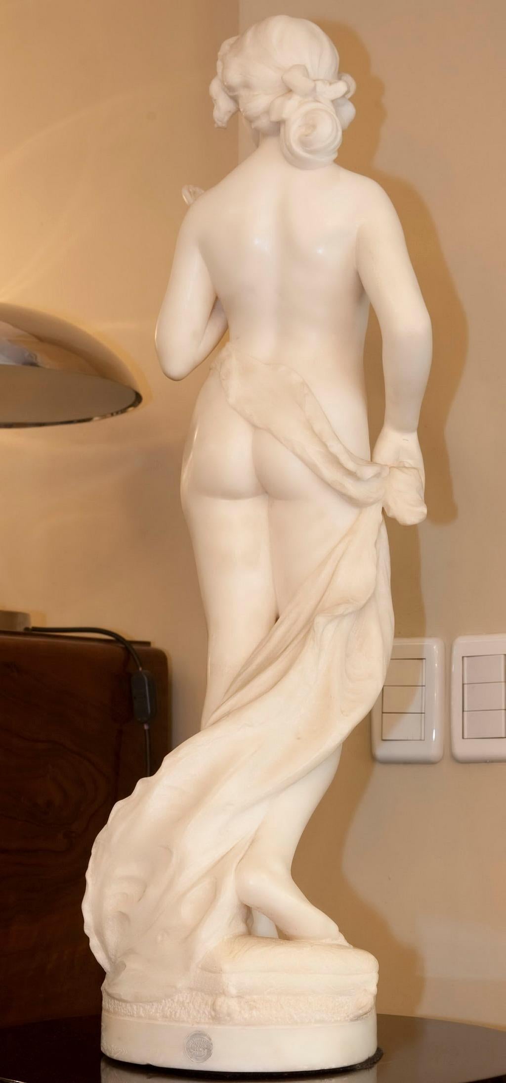 Woman with mirror Sculpture in Marble 
Sign: Prof. Jory 
Galleria Lapini Firenze
Sold by: Casa Bellas artes Av. de Mayo 625
We have specialized in the sale of Art Deco and Art Nouveau and Vintage styles since 1982.If you have any questions we are at