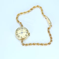 Woman's 14k Yellow Gold Tiffany and Co. Watch with Baum and Mercier Movement