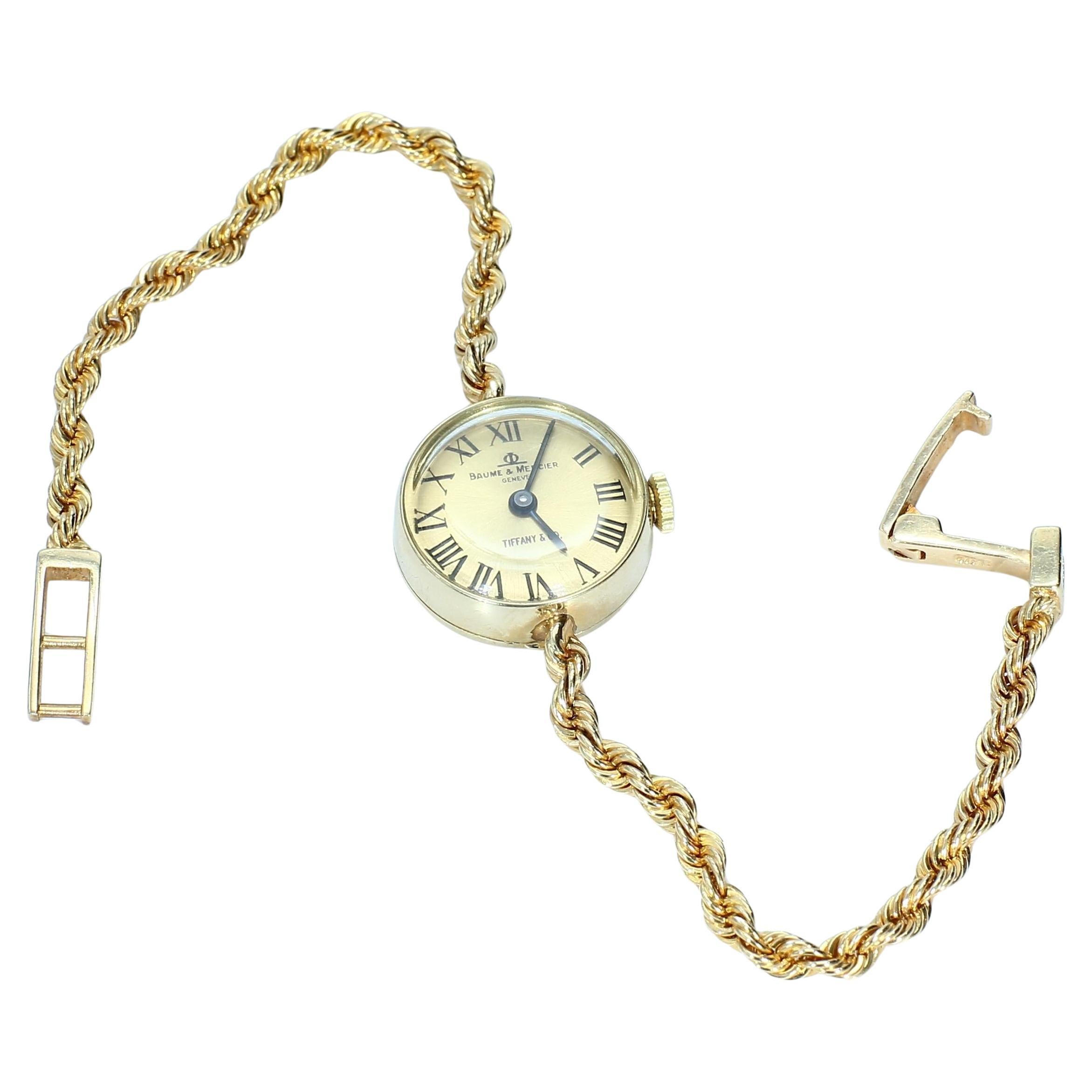 Woman
s 14k Yellow Gold Tiffany and Co. Watch with Baum and Mercier Movement For Sale