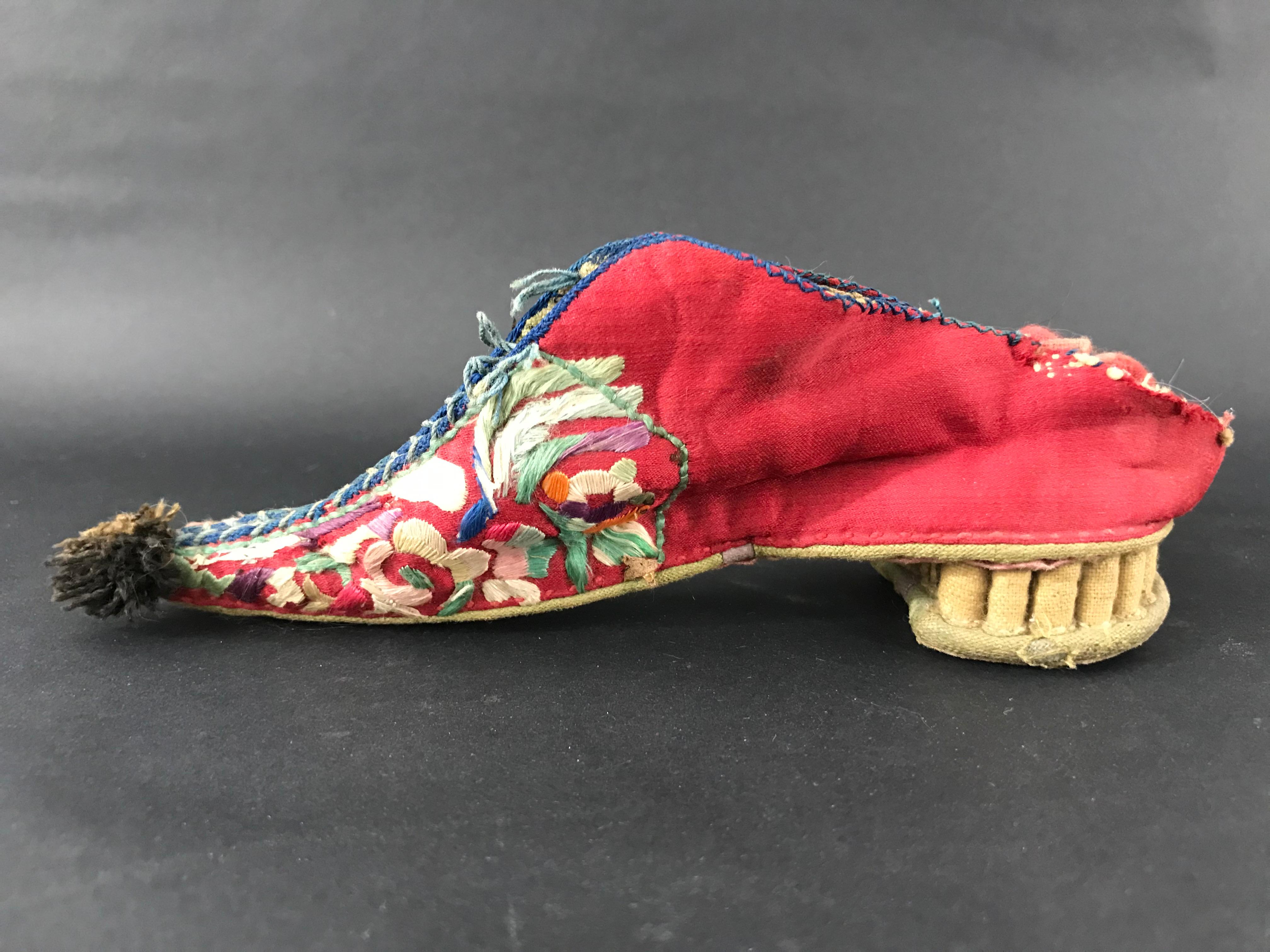 Chinoiserie Woman's Footwear with Bandaged Feet China, circa 1900