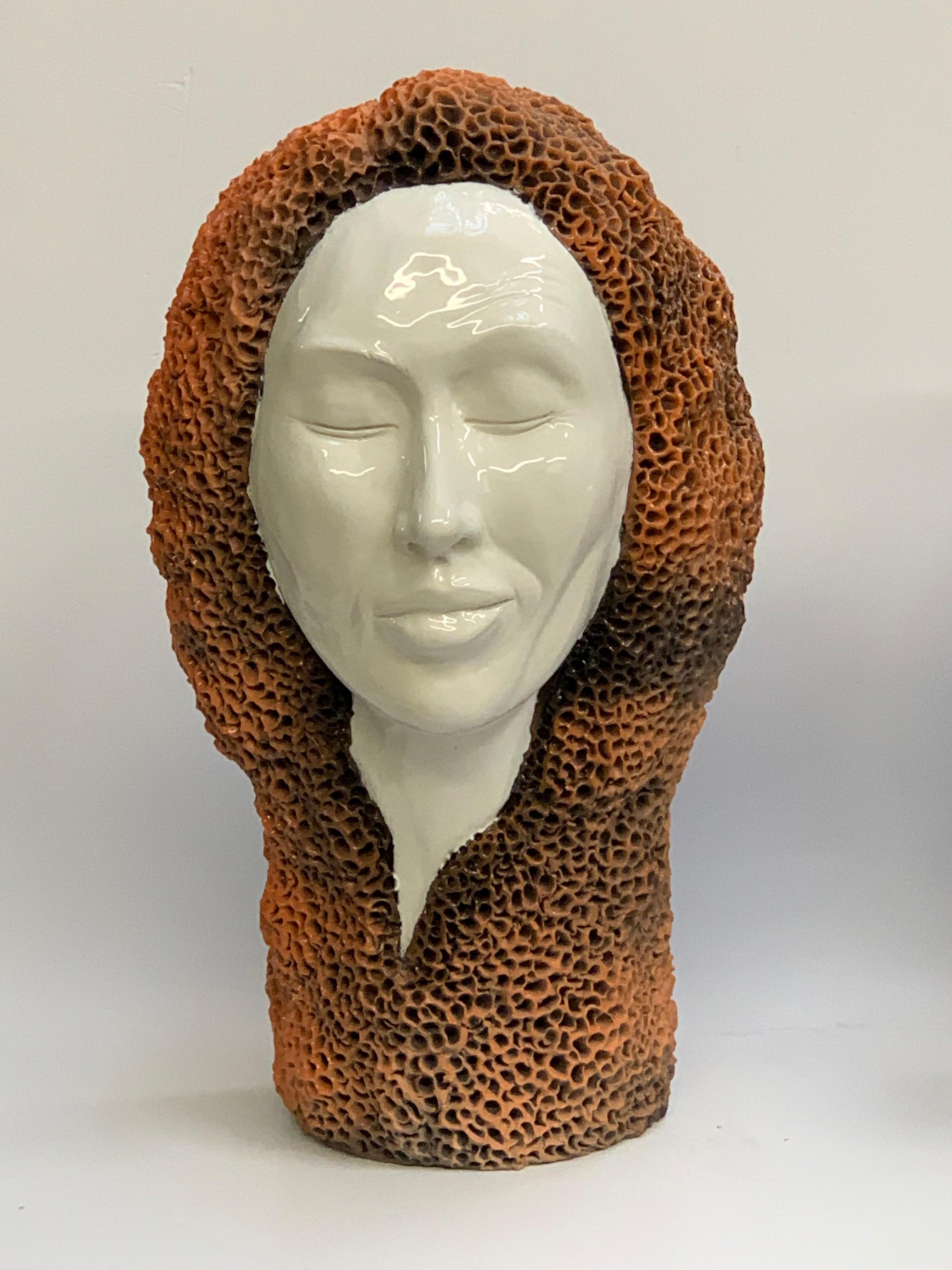 The piece is a unique representation of a woman's head in a modern way.
Our designer creates these pieces completely by hand.
 