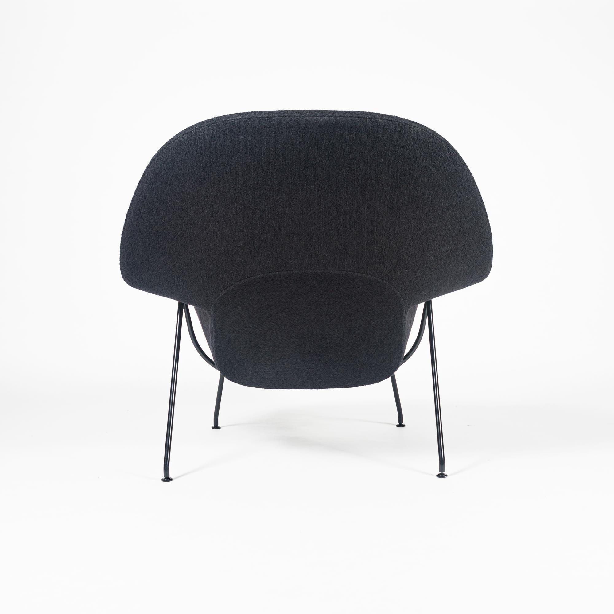 Womb chair by Eero Saarinen for Knoll in Onyx black Knoll boucle fabric with black metal legs. Original Knoll Tag under the chair.
    
