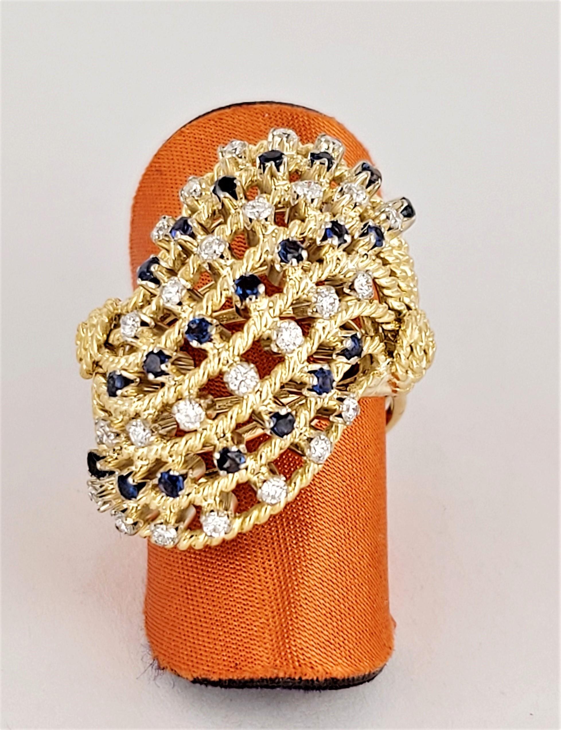 Elegantly grafted, this cluster ring radiates timeless beauty with is exquisite design and brilliant finish, perfect for marking life's special moments.

Material 18K Yellow Gold
Diamonds:
Carat: .75
Clarity: SI1
Color Grade: G
Sapphire: .75ct

Ring