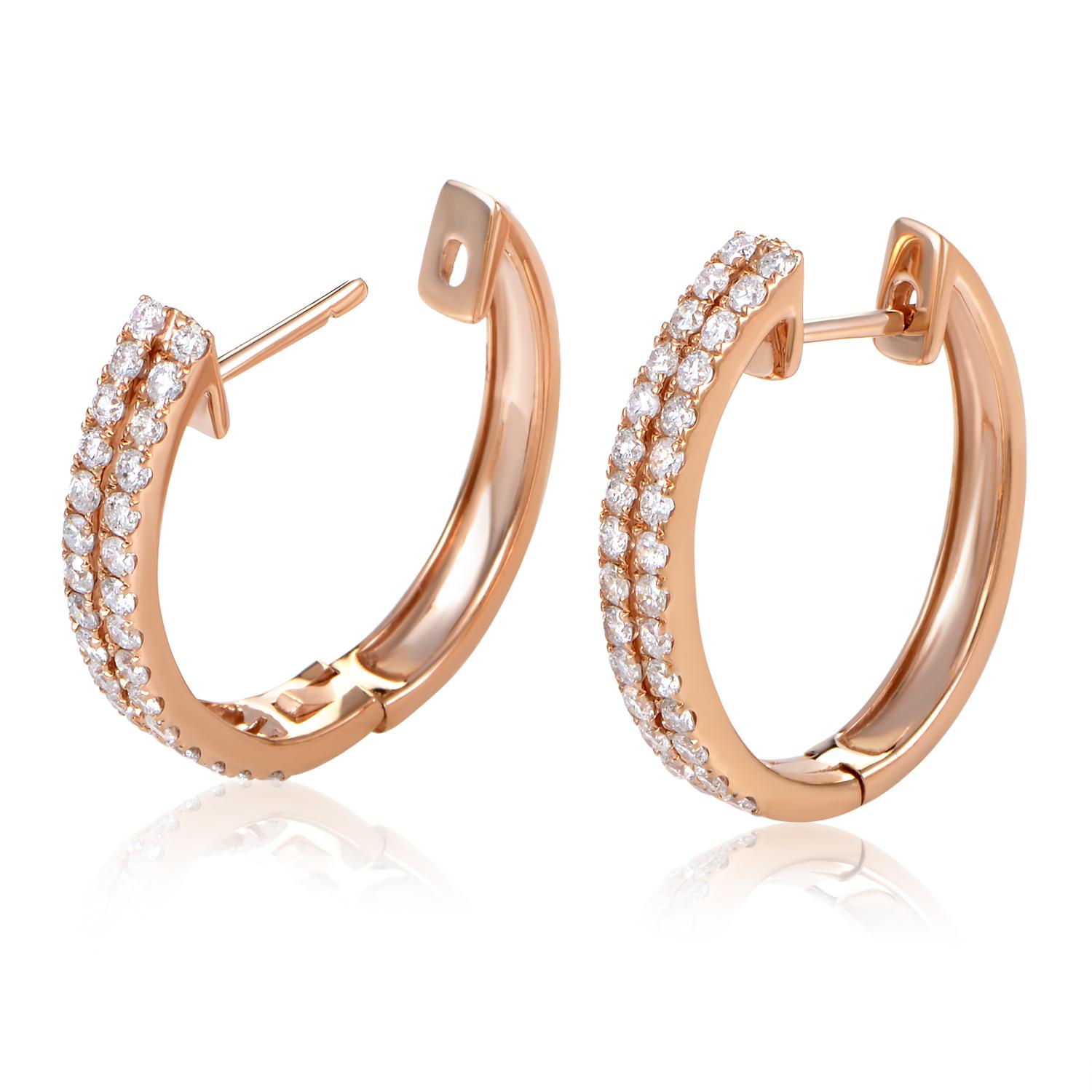 Gorgeous diamonds are the hallmark of this classic design. This pair of earrings are made of 14K rose gold and are paved with .96ct of white diamonds.