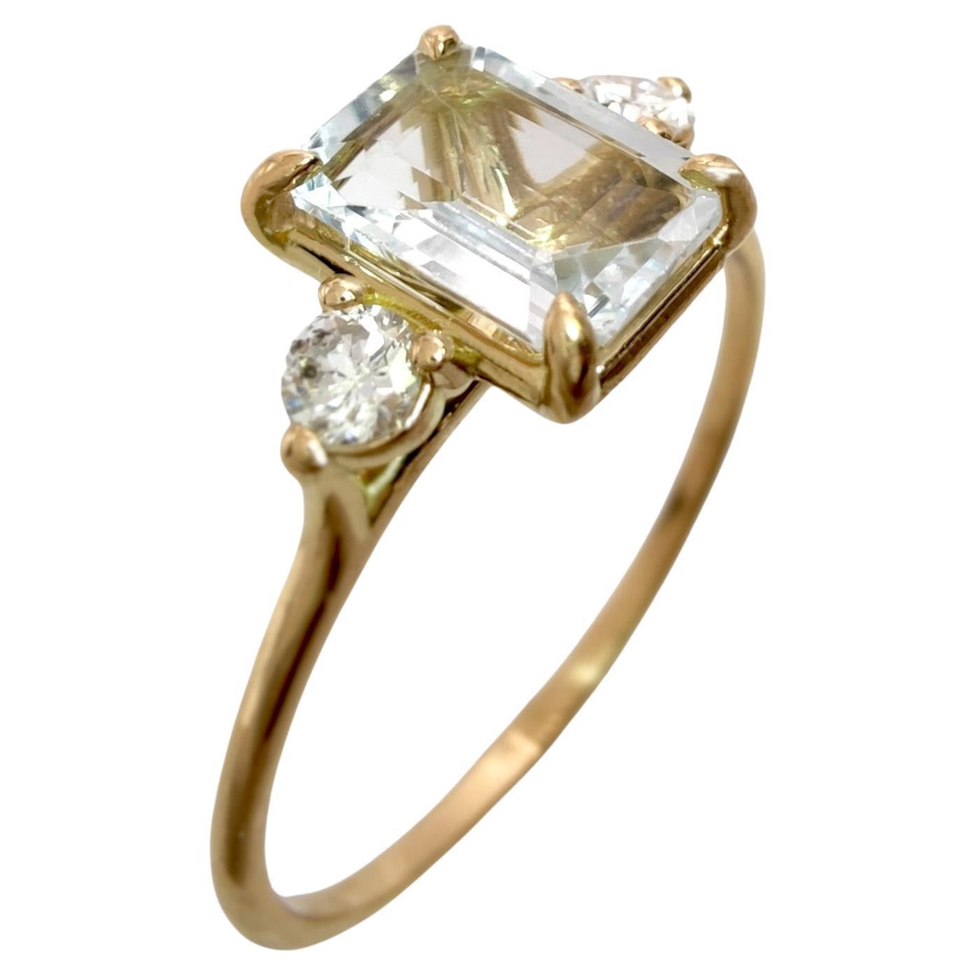 Women's 18K Gold Ring - 0.8 Carat Central Aquamarine- 0.13 Total Carat Diamond
