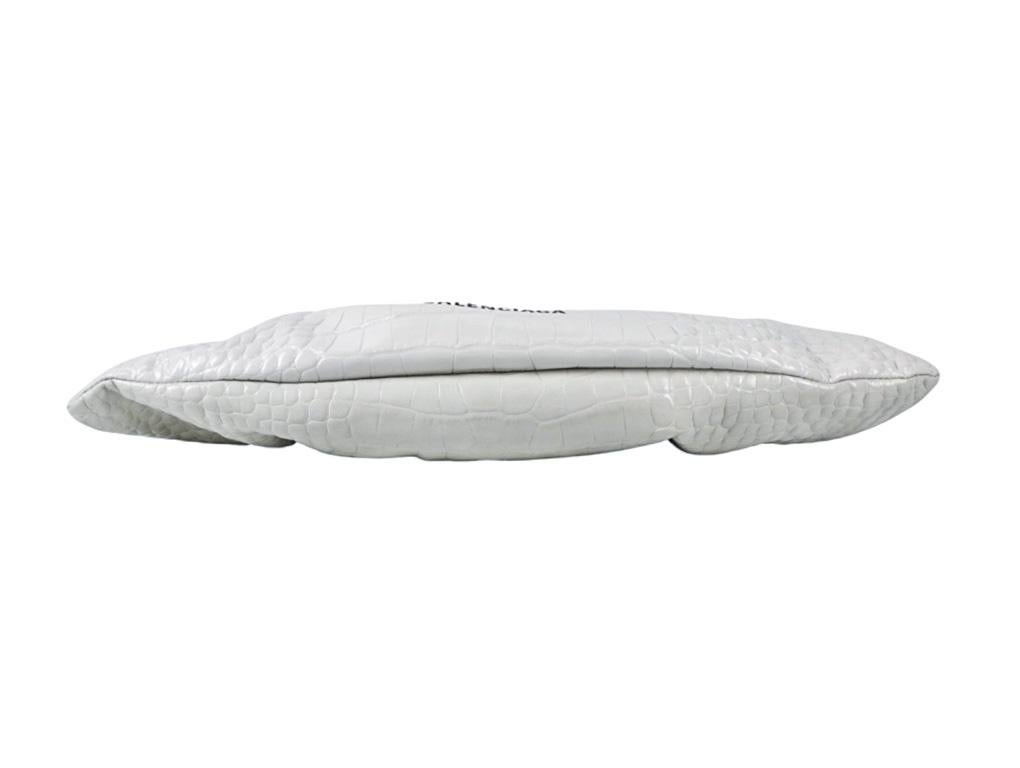 white designer clutch bag