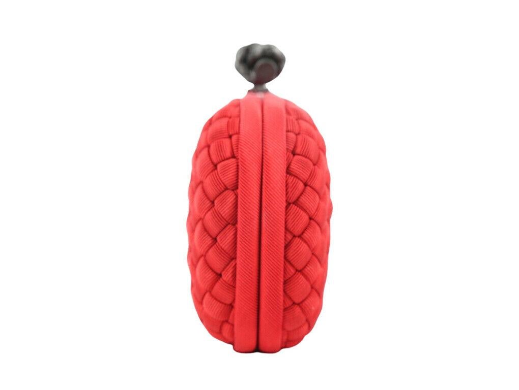 Such a cutie Bottega Veneta Intreciatto Clutch for sale in a stunning red colour. This is a preloved item and is in excellent condition.

BRAND	
Bottega Veneta

ACCESSORIES	
Bag only

COLOUR	
Red

CONDITION	
Used – Excellent

FEATURES	
(Made in