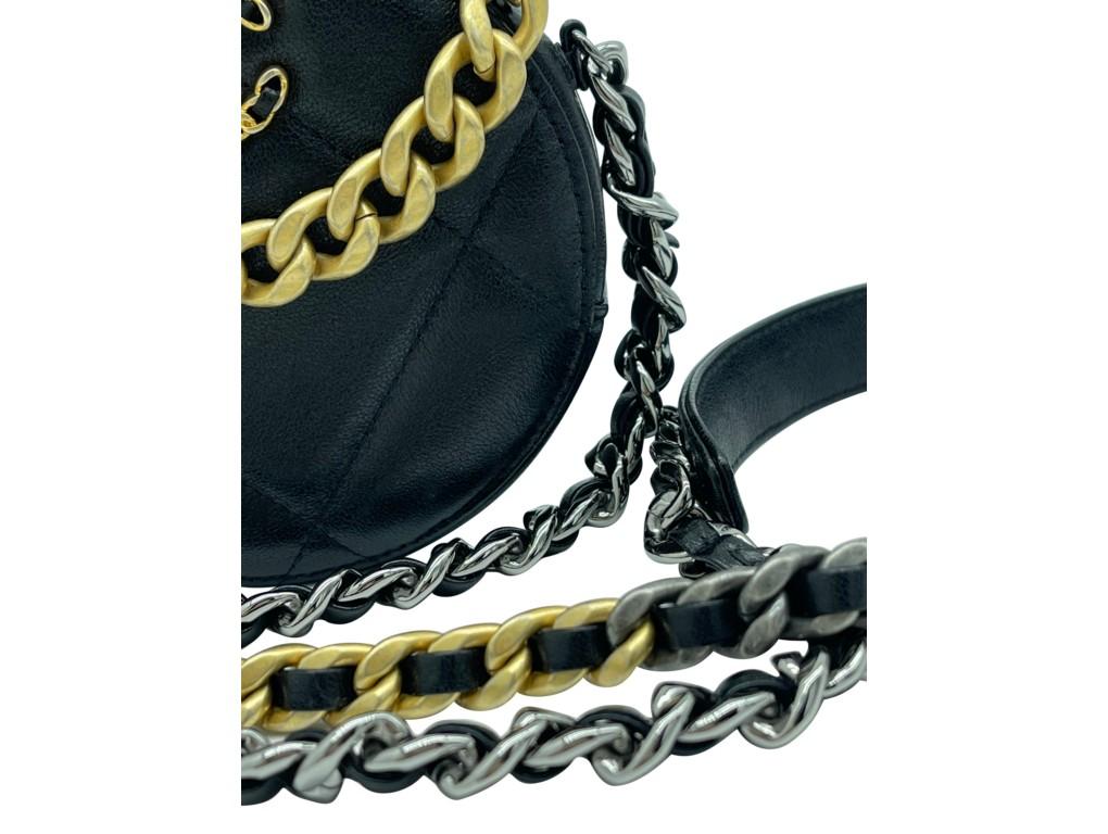 This is an exquisite piece and constantly sold out. The Chanel 19 round clutch with 2 chains in black lambskin leather with gold, silver and ruthenium hardware. A new item for sale.

BRAND	
Chanel

FEATURES	
CC logo on the front, chain-link shoulder
