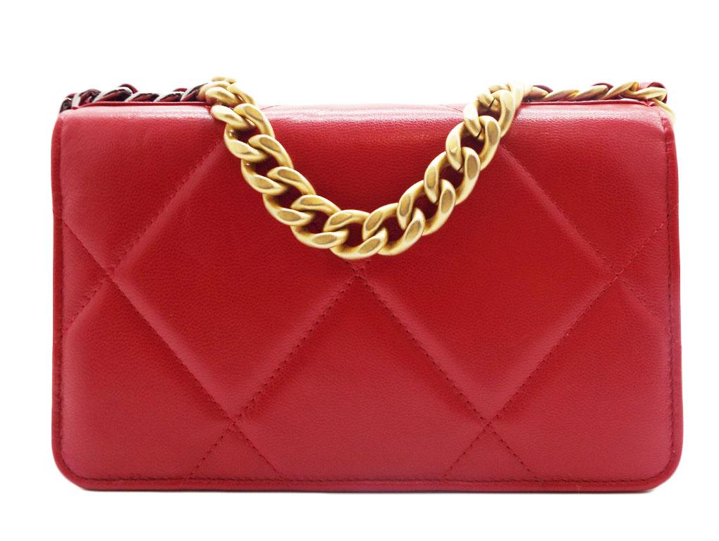 This is an exquisite piece, the Chanel 19 wallet on chain with 2 chains in red lambskin leather with gold, silver and ruthenium hardware. An as new item for sale which has been only handled for photos.BRAND	
Chanel

FEATURES	
CC logo on the front,