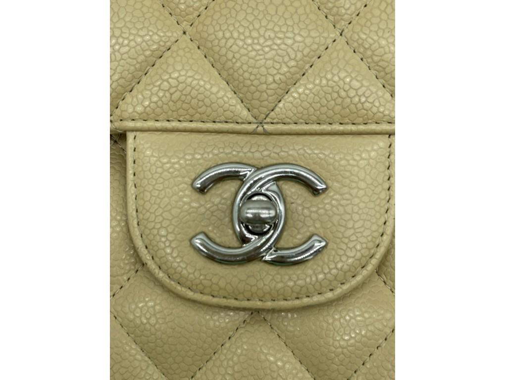 A wonderful Chanel Jumbo-sized Classic Double Flap bag for sale. Made from beige caviar leather with silver hardware. A preloved bag for sale in used, good condition. There are flaws to the bag (please do look at photos) namely: faded colour at the