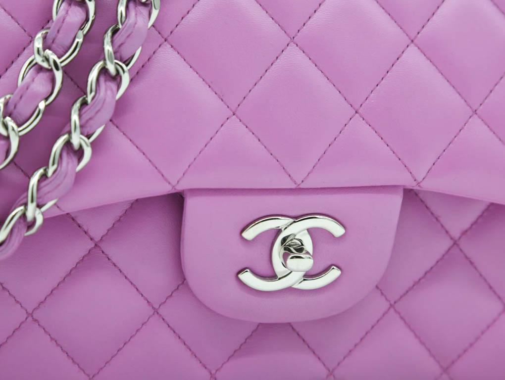 A wonderful Chanel Jumbo-sized Classic Double Flap bag for sale. Made from pink lambskin leather with silver hardware. A preloved bag for sale in used, excellent condition.

BRAND	
Chanel

FEATURES	
CC Clasp Closure, One exterior slip pocket, One