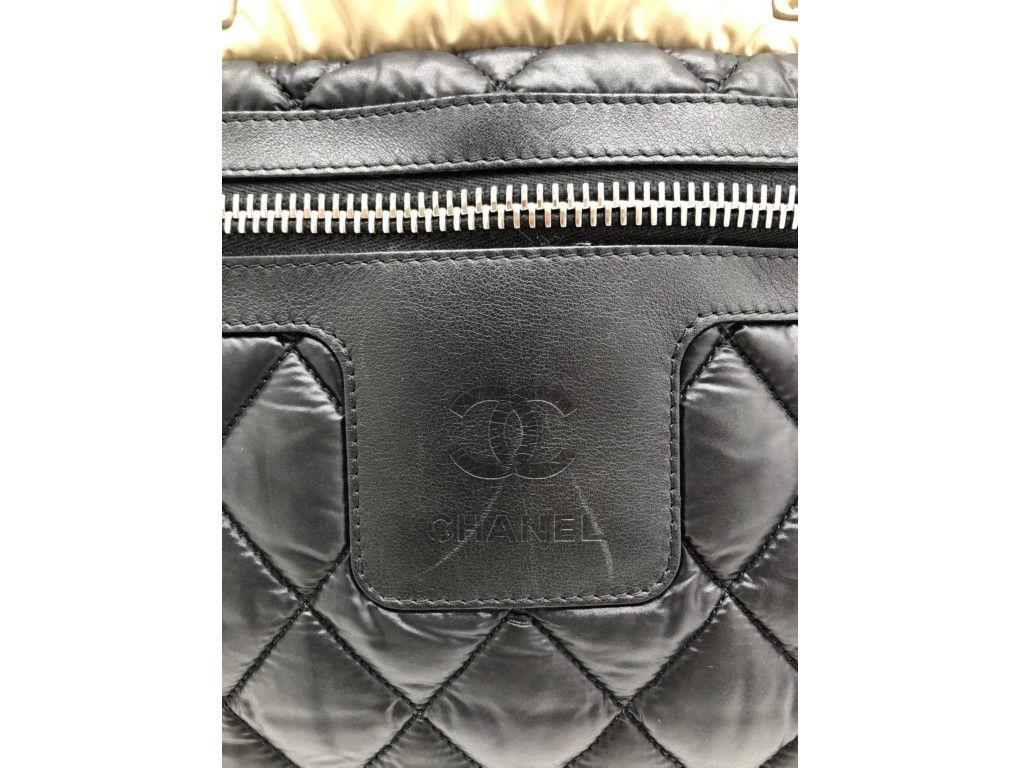 Lovely Chanel Cocoon bag in black and beige leather and puffy canvas. This bag will mould to any body shape and is exquisite to feel. A preloved bag which is in Very good condition, but do look at the photos as the inside of the handles have become