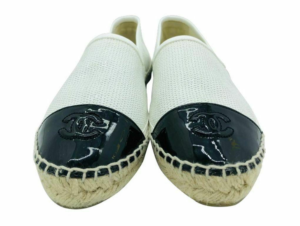Excellent Chanel Espadrilles for sale in a size 36 (UK3). A pre-Loved pair in patent leather and sequins. Excellent condition.
BRAND	
Chanel

FEATURES	
CC Logo Detail, Leather Espadrilles, Sole thickness 2cm 

MATERIAL	Leather,