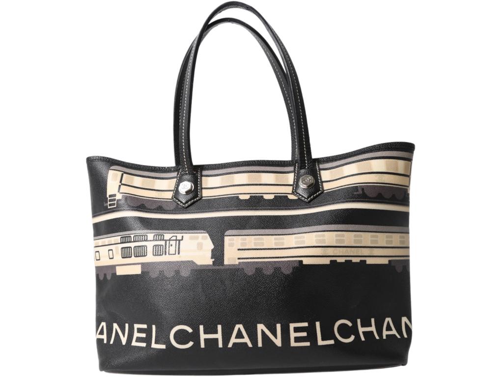 This Limited Edition Chanel Le Train Tote Bag is stunning and is made from canvas. Finished off with two leather shoulder straps.. Wear the bag handheld or as a shoulder bag. So soft that it moulds to any body shape. A preloved bag in excellent