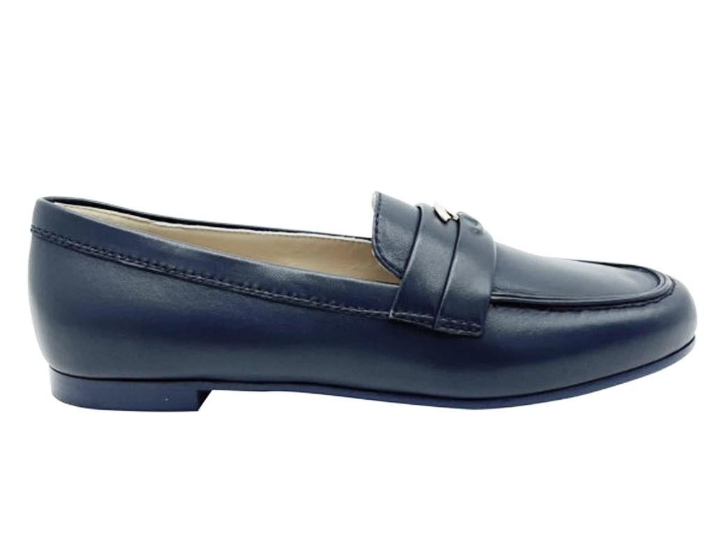 Beautiful and stunning Chanel Navy blue leather loafers, mocassins finished off with CC logo.

BRAND	
Chanel

FEATURES	
CC logo detail, Loafers

COLOUR	
Navy blue

CONDITION	
New

MEASUREMENTS	
39

ACCESSORIES	
Box, Dustbag

PRODUCT TYPE	
Shoes