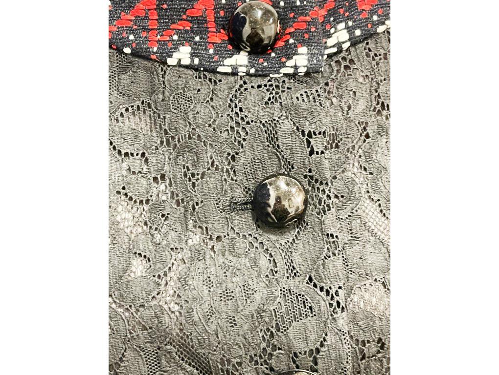 Stunning Chanel Cotton Tweed jacket from 2015 Collection in a size 40. Purchased and never worn. The label has been cut on the inside which denotes a sale item.

BRAND	
Chanel

FEATURES	
4 buttoned opening,  chain detail on inside, lace detail, silk