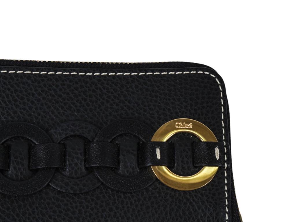 Lovely Darryl wallet, purse from Chloe. Purchased and never used.


Colour
Black
Material
Leather
Hardware
Gold
Condition
As New
Height / Width/ Depth
8cm / 13.5 cm
Size
Small

Dustbag
Features                Change and card holder, contrasting