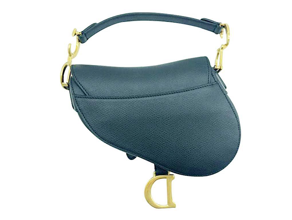 Gorgeous black leather Mini Saddle bag from Dior with gold hardware, just exquisite. Used a handful of times and in excellent condition. There is an indentation on the inside where the front flap has been lying so do look at