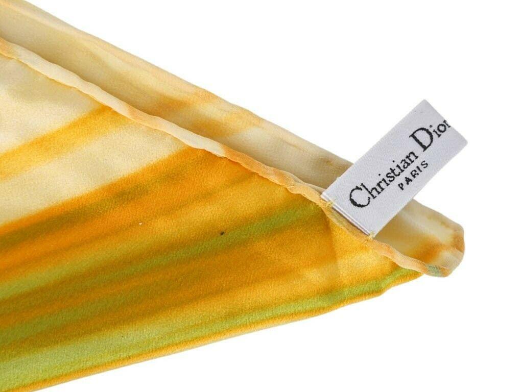 Gorgeous yellow, green and purple scarf by Dior featuring Dior logo in the middle. A preloved scarf in excellent condition.

BRAND Dior ACCESSORIES Scarf Only COLOUR Green, Purple, Yellow CONDITION Used – Excellent FEATURES Dior Logo pattern