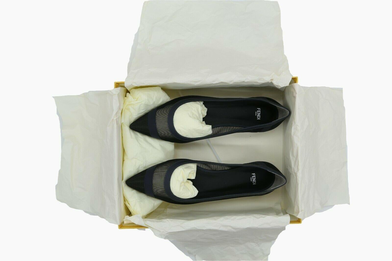 A lovely pair of Fendi Colibri pointed flats in a size 38.5. Made of mesh, with black hue and blue leather trims. Stored since purchased – never used.



BRAND	

Fendi



COLOUR	

Black, Navy Blue



ACCESSORIES	

Box, dustbag, Tag



CONDITION	

As
