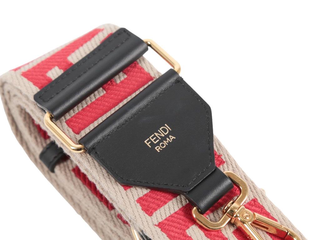 This exquisite FF mono Fendi strap in red is so lush. Two gold metal snap hooks perfect to personalise your bag. This strap is in preloved, excellent condition.



BRAND	

Fendi



ACCESSORIES	

Box, dustbag, Tag



COLOUR	

Red



CONDITION	

Used
