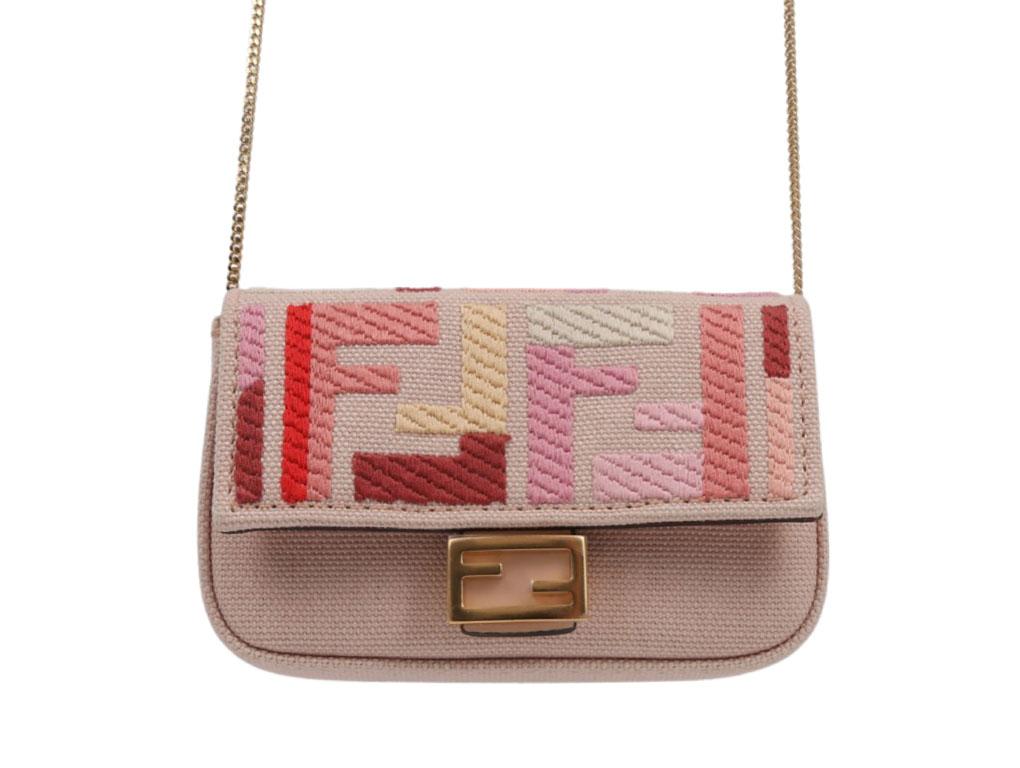 Beautiful Mini Baguette bag by Fendi for sale.  Wear as a cross body, shoulder or hand held. Purchased, stored and never used. 

BRAND	
Fendi

ACCESSORIES	
Box, dustbag, Detachable strap

COLOUR	
Pink

CONDITION	
New

FEATURES	
Baguette bag Mini,