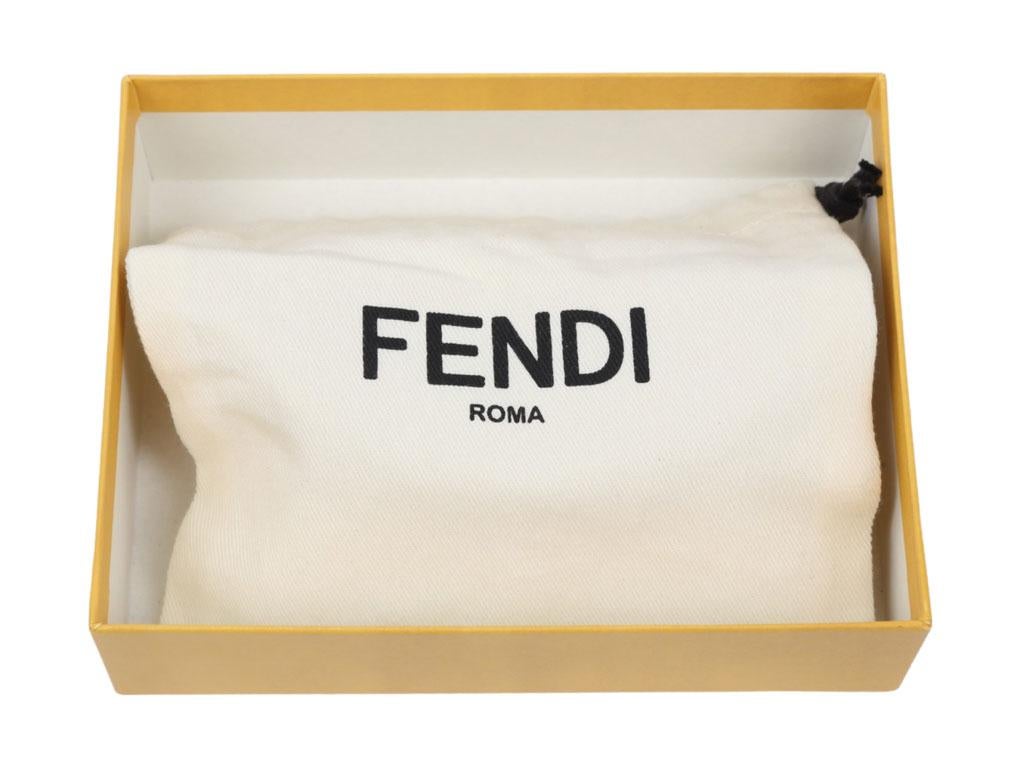 Such a cute Nano Bag Charm/ Handbag by Fendi for sale. The clip allows it to be attached to larger bags or belts. It can also be worn cross-body thanks to the fine chain shoulder strap. Lining with flat pocket. Purchased, stored and never used.