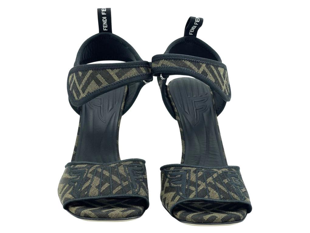 Exquisite pair of heeled slingback sandals by Fendi. The detail on the front and heel is exquisite.  Made in a size 38.5 (UK 5.5) and in new condition.
BRAND	
Fendi

FEATURES	
Embroidered detail, FF Mono, slingback sandals 

MATERIAL	
canvas