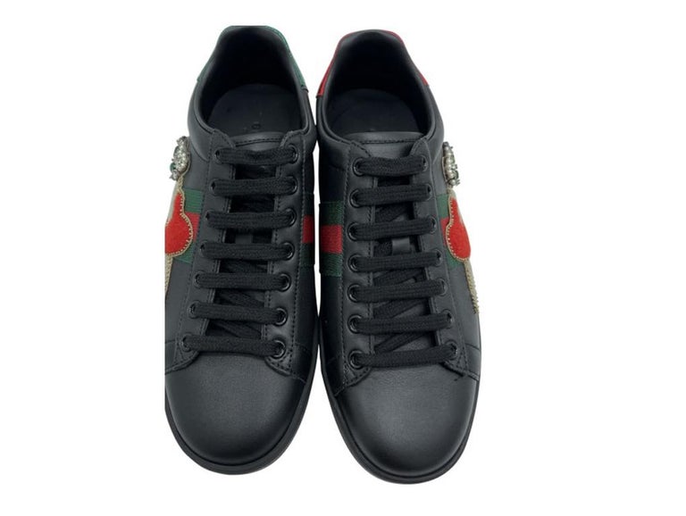 Perfect pair of Ace trainers by Gucci with encrusted diamond stone detail on the dagger!  A New pair for sale 

BRAND	
Gucci

FEATURES	
Made in Italy, Crystal detail, heart dagger design