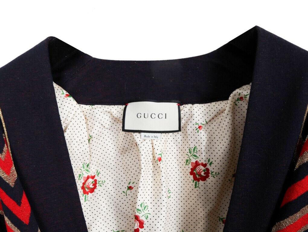 Gorgeous belted jacket by Gucci in a lovely zig zag pattern. Used less than a handful of times and in excellent condition. Size XS and the price is amazing..!

BRAND	

Gucci



FEATURES	

(Made in Italy), Belted Front, Flower Silk Lining, Zig Zag