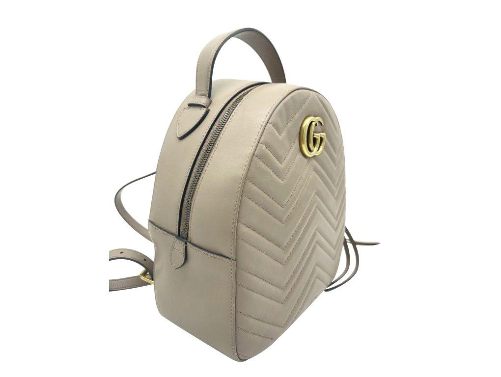 Such an elegant Gucci Marmont Backpack for sale in beige coloured leather with gold hardware. A preloved item in excellent condition.

BRAND	
Gucci

ACCESSORIES	
Bag only

COLOUR	
Beige

CONDITION	
Used – Excellent

FEATURES	
GG Hardware, an open