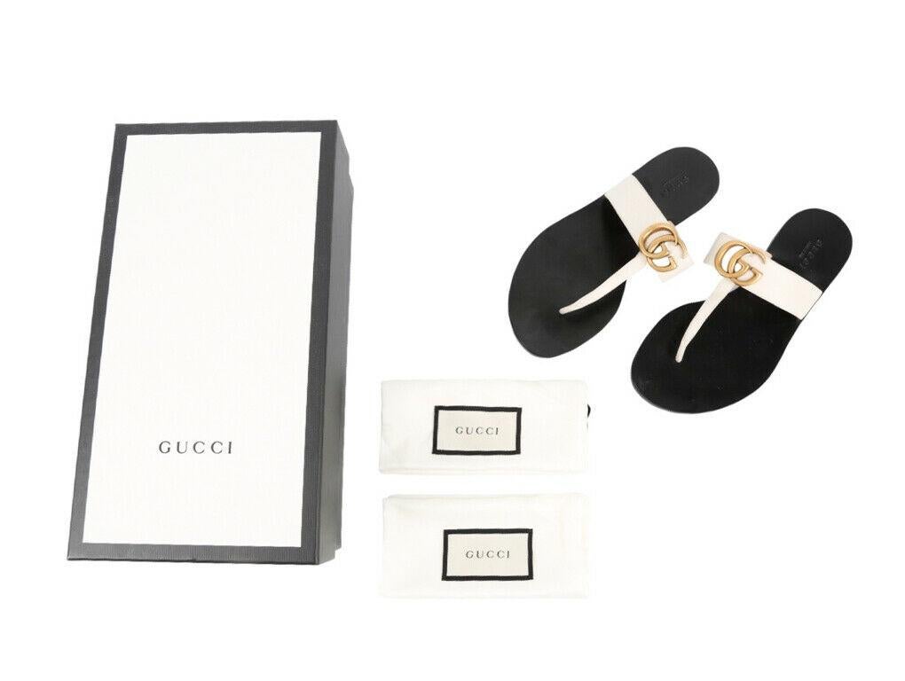 Wunderschönes Paar Gucci Marmont Thong flache Sandalen in der Größe 36,5 (UK 3,5). Ein gebrauchtes Paar in ausgezeichnetem Zustand.

BRAND	
Gucci

MERKMALE	
(Made in Italy), GG Detail, Tanga, 

MATERIAL	
Obermaterial