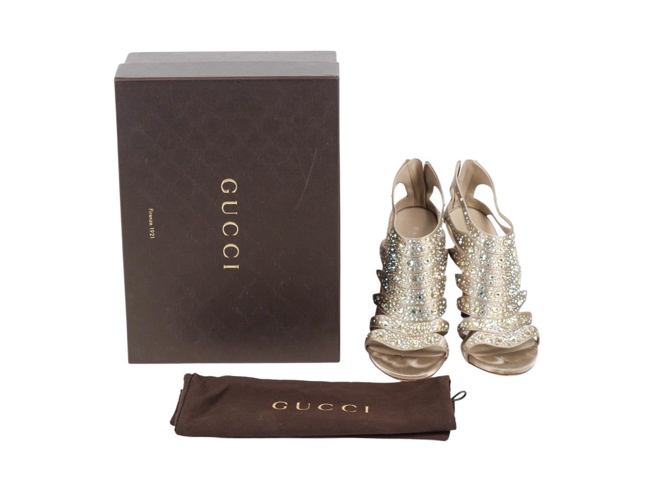 Stunning pair of Gucci Taupe and crystal embellished strappy Sandals in satin. These are a size 39 (UK 6) and have been lovingly used - do look at the photos.

Colour
Taupe
Material
Satin
Condition
Used - Very Good
Size
39 (UK 6)
Original