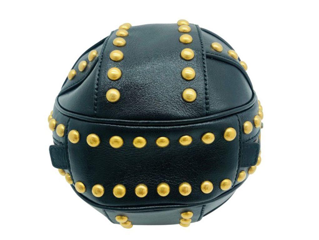 Exquisite ball design handbag. The Gucci Tifosa is made from black leather with gold studded detail throughout.  A new bag for sale.



BRAND	
Gucci

ACCESSORIES	
Care card, Dustcover

COLOUR	
Black

CONDITION	
New

FEATURES	
antique gold studs,