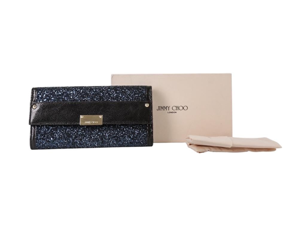 A lovely Jimmy Choo Navy Blue and Black glitter clutch bag for sale.  A preloved bag in excellent condition.
Colour
Navy Blue/Black
Material
Leather
Hardware
Gold
Condition
Used - Excellent
Height / Width/ Depth
13 cm / 24 cm / 3