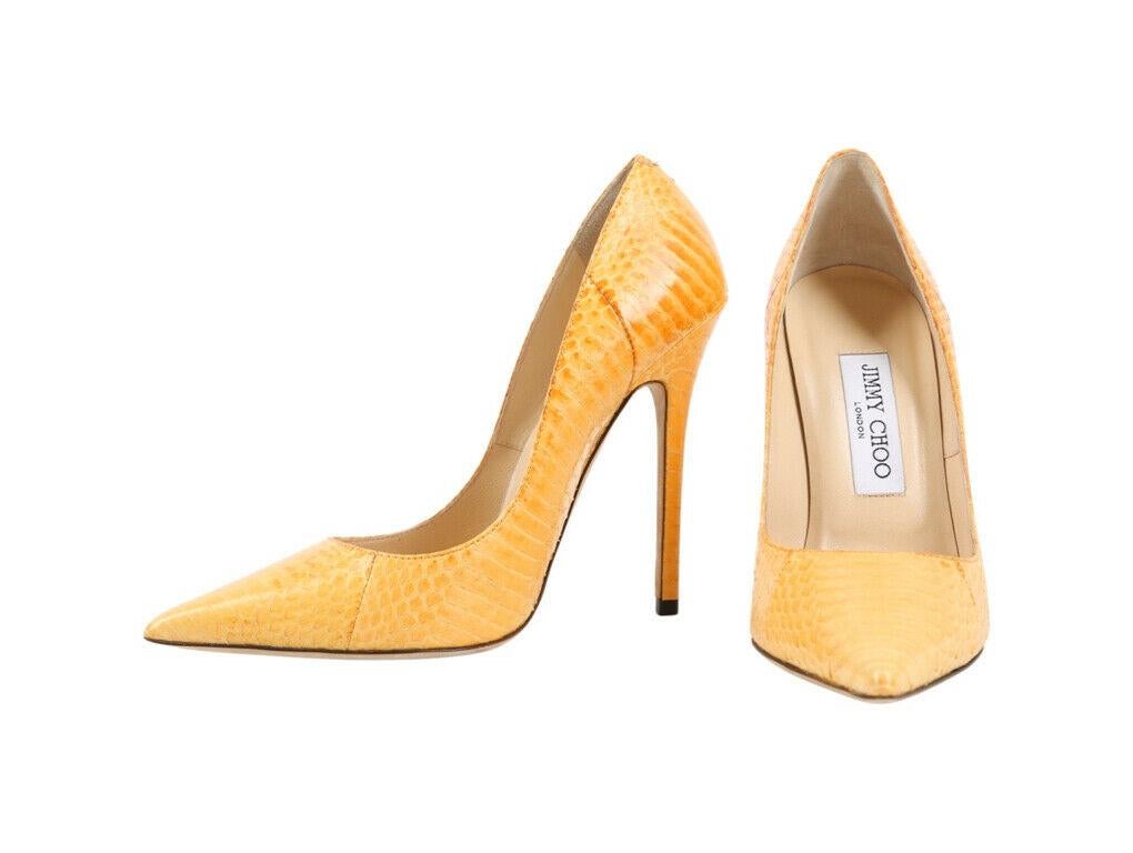 A lovely pair of Jimmy Choo exotic skin yellow leather heeled pumps.  A preloved pair which are in excellent condition.

BRAND	
Jimmy Choo

COLOUR	
Yellow

ACCESSORIES	
Shoes only

CONDITION	
Used – Excellent

FEATURES	
Exotic Leather, Pointed toe