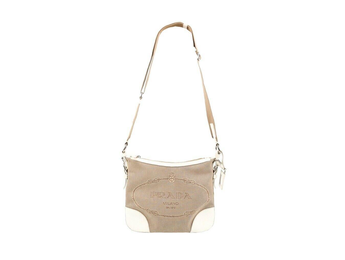 This Prada Canapa crossbody bag in beige and white is divine. Wear as a crossbody or shoulder bag. A preloved bag in good condition - please see photos.

Colour
Beige-White
Metal Material
Leather, Canvas
Hardware
Silver
Condition
Used-Good
Height /